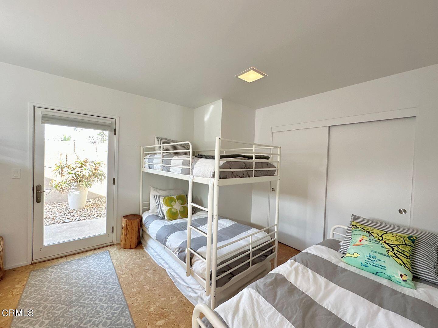 3600 Ocean Drive Oxnard, CA 93035 - Photo 28 of 36 a bedroom with furniture and a window