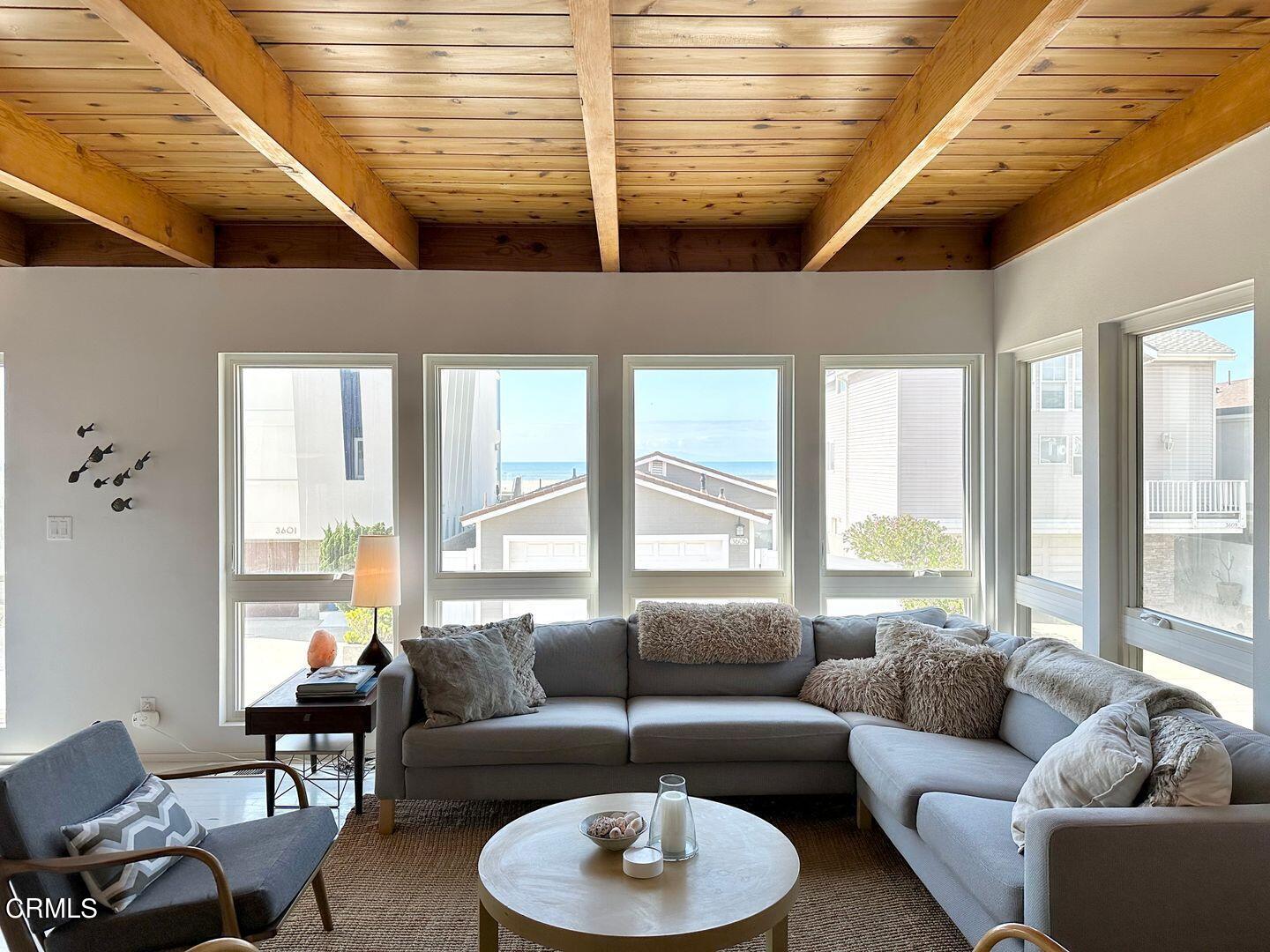 3600 Ocean Drive Oxnard, CA 93035 - Photo 6 of 36 a living room with furniture and a large window