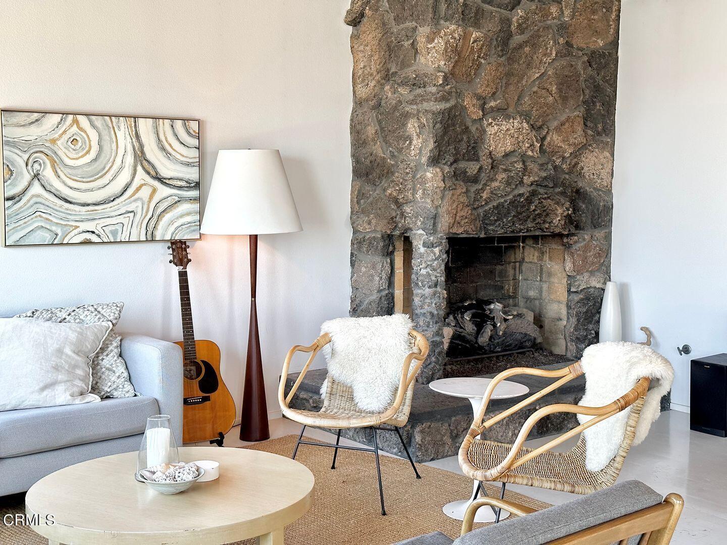 3600 Ocean Drive Oxnard, CA 93035 - Photo 8 of 36 a living room with furniture and a lamp