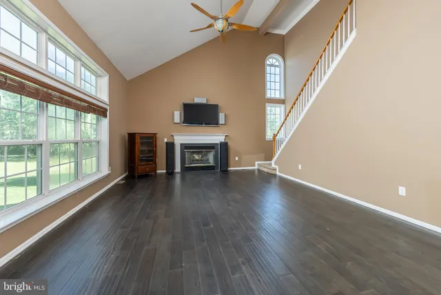 a view of a room with windows