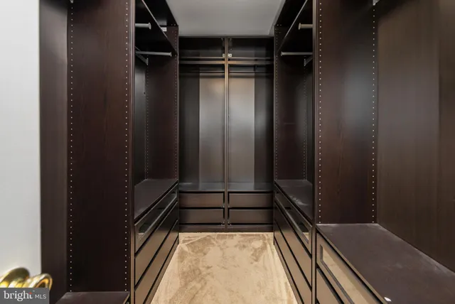 a bathroom with a bathtub sink and window