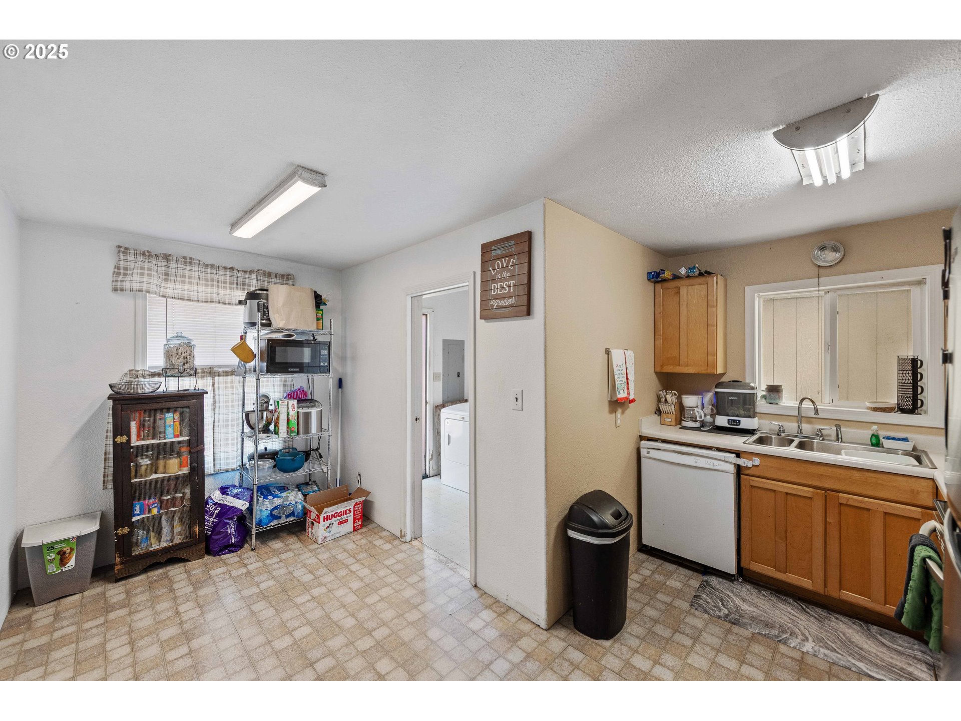 805 C Street Myrtle Point, OR 97458 - Photo 16 of 30 a kitchen with refrigerator and sink