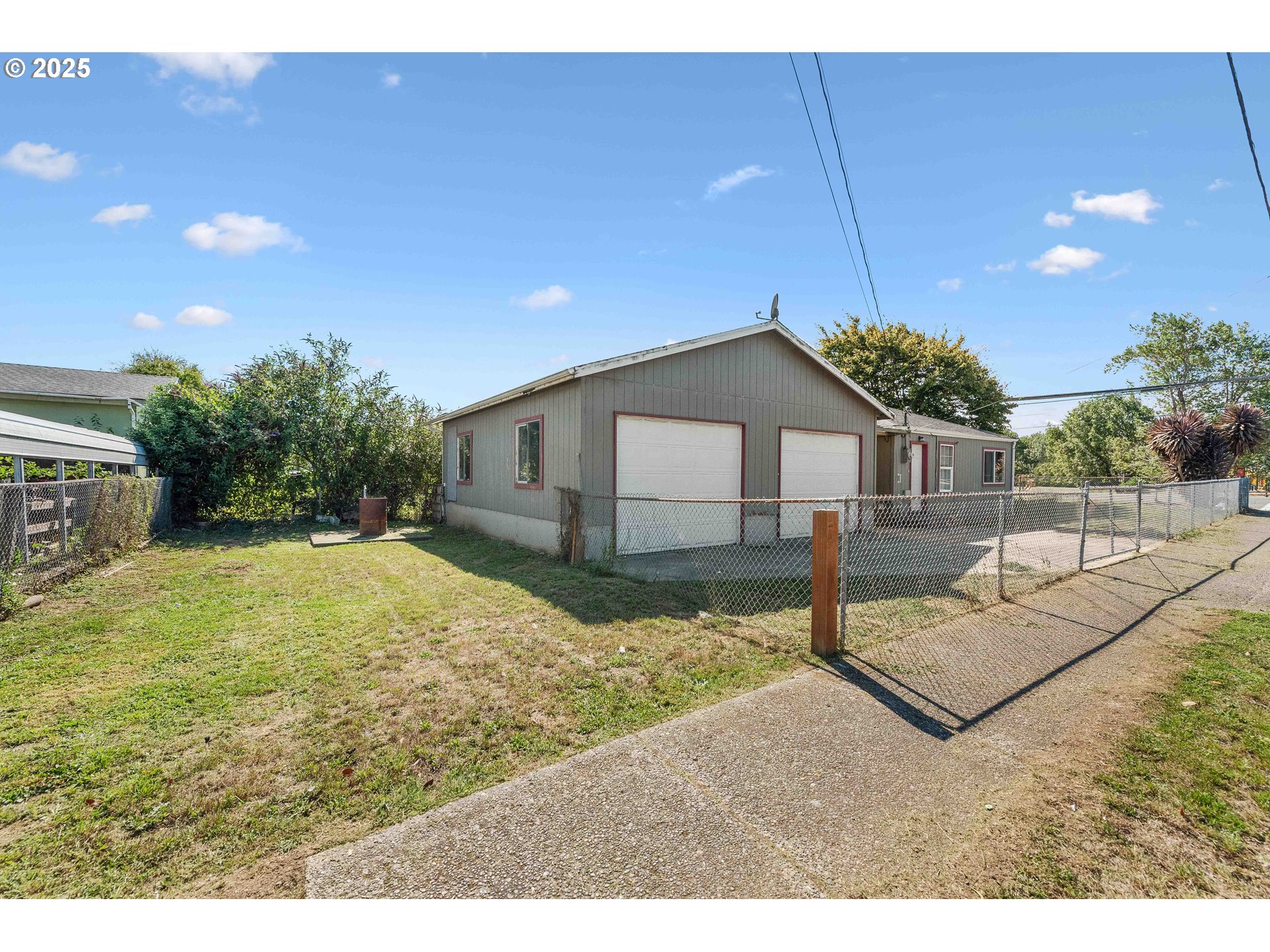 805 C Street Myrtle Point, OR 97458 - Photo 4 of 30 a house view with a backyard space