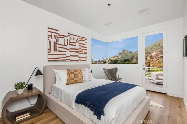 a bathroom with a granite countertop sink double and mirror