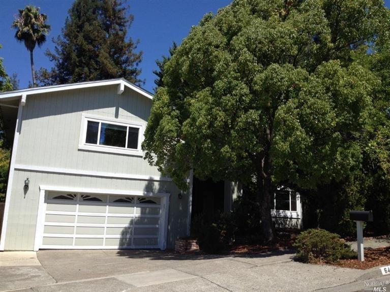 648 Rinaldo Street Santa Rosa, CA 95409 - Photo 1 of 1 a front view of a house with a tree