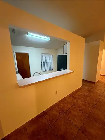 a view of a livingroom with furniture