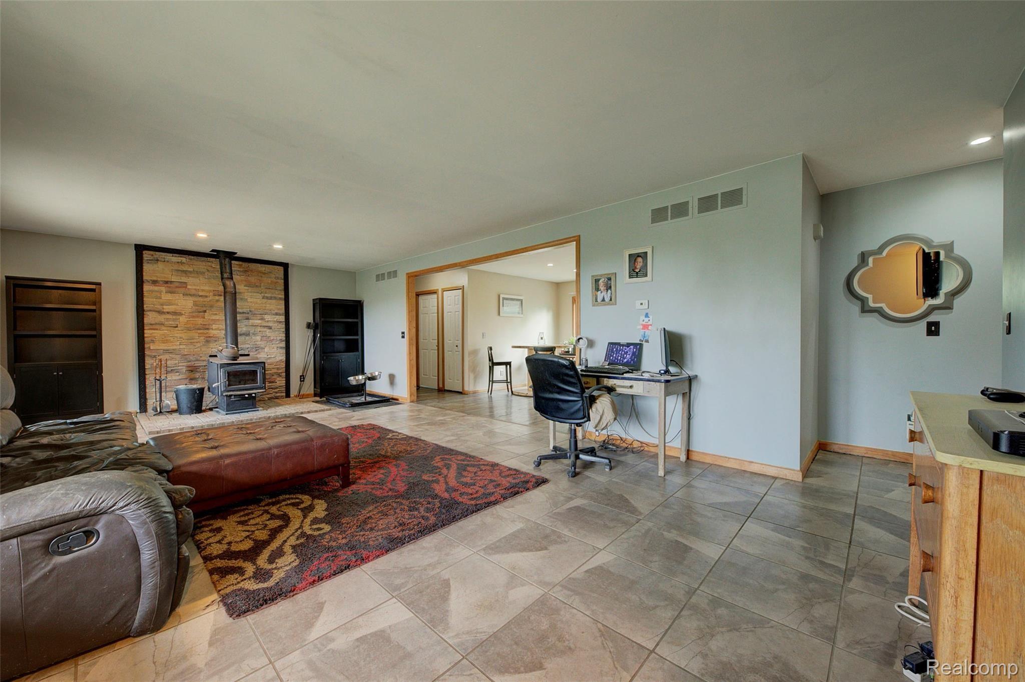 9103 Pierson Road Fowlerville, MI 48836 - Photo 6 of 35 living room.jpg