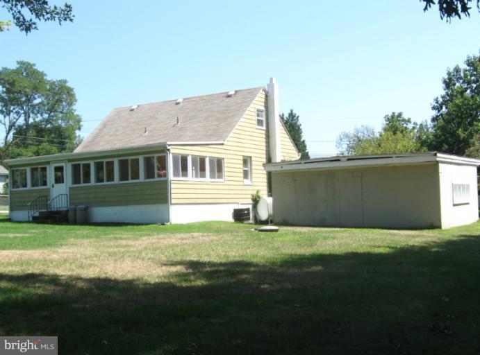 876 Hillside Avenue Edgewater, MD 21037 - Photo 2 of 20 Back yard looking at house and garage