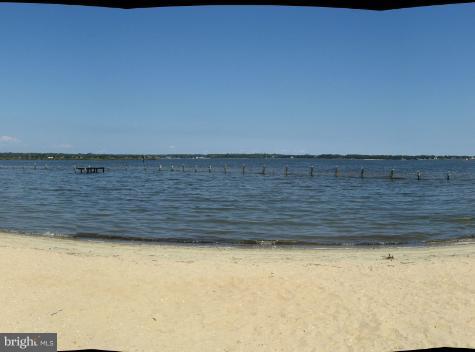 876 Hillside Avenue Edgewater, MD 21037 - Photo 17 of 20 Sandy beach with netted swimming