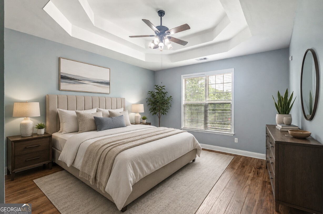 82 Newton Road LaGrange, GA 30240 - Photo 8 of 45 a bedroom with a large bed and a window