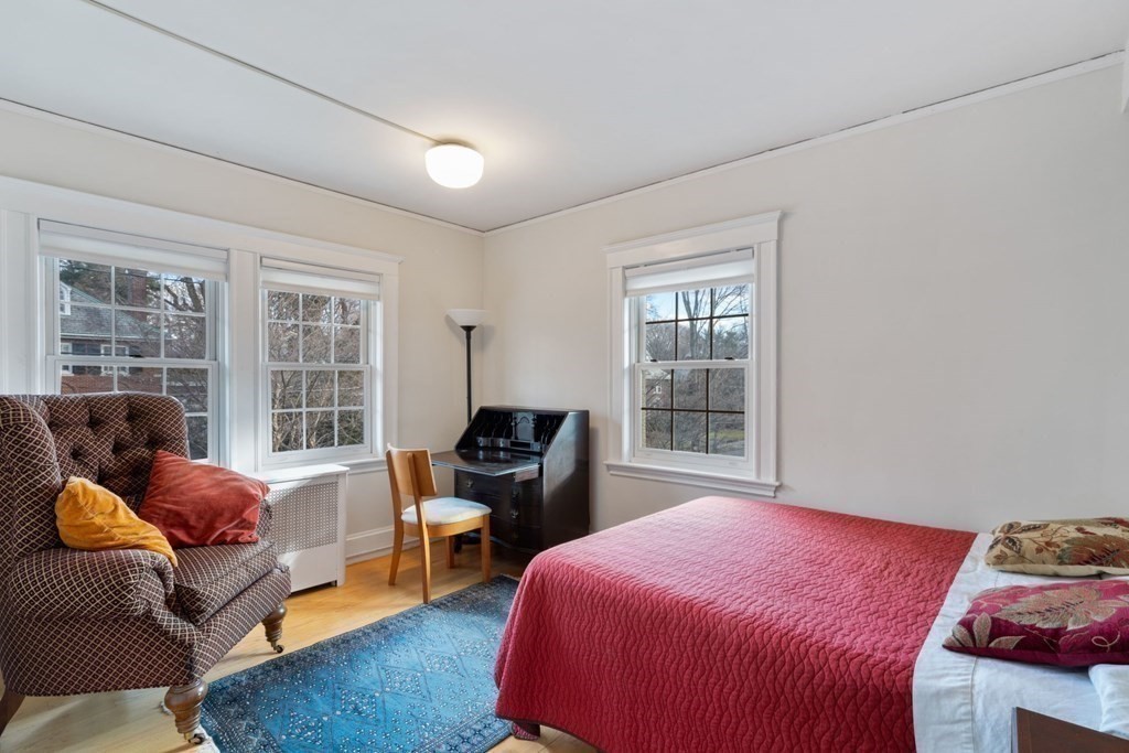 27 Nobscot Road Newton, MA 02459 - Photo 12 of 25 a bedroom with a bed and a window