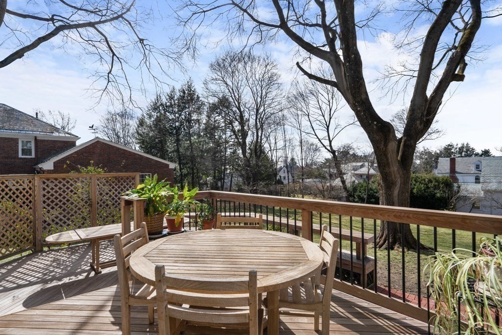 27 Nobscot Road Newton, MA 02459 - Photo 5 of 25 a view of balcony with wooden floor and outdoor seating