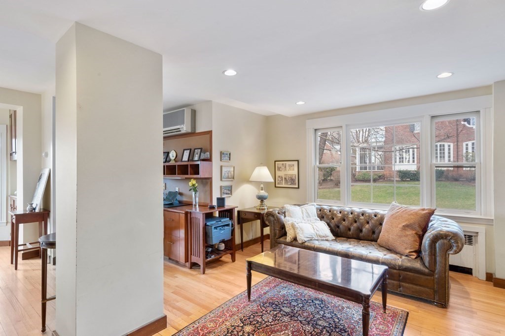 27 Nobscot Road Newton, MA 02459 - Photo 8 of 25 a living room with furniture and a large window