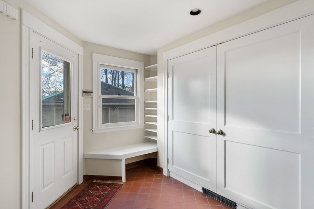 27 Nobscot Road Newton, MA 02459 - Photo 9 of 25 a bathroom with a bathtub and a shower
