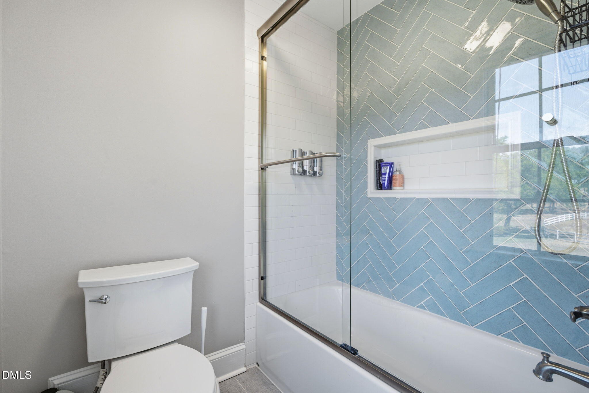 5416 Pulley Town Road Zebulon, NC 27597 - Photo 32 of 74 a bathroom with a toilet and a shower