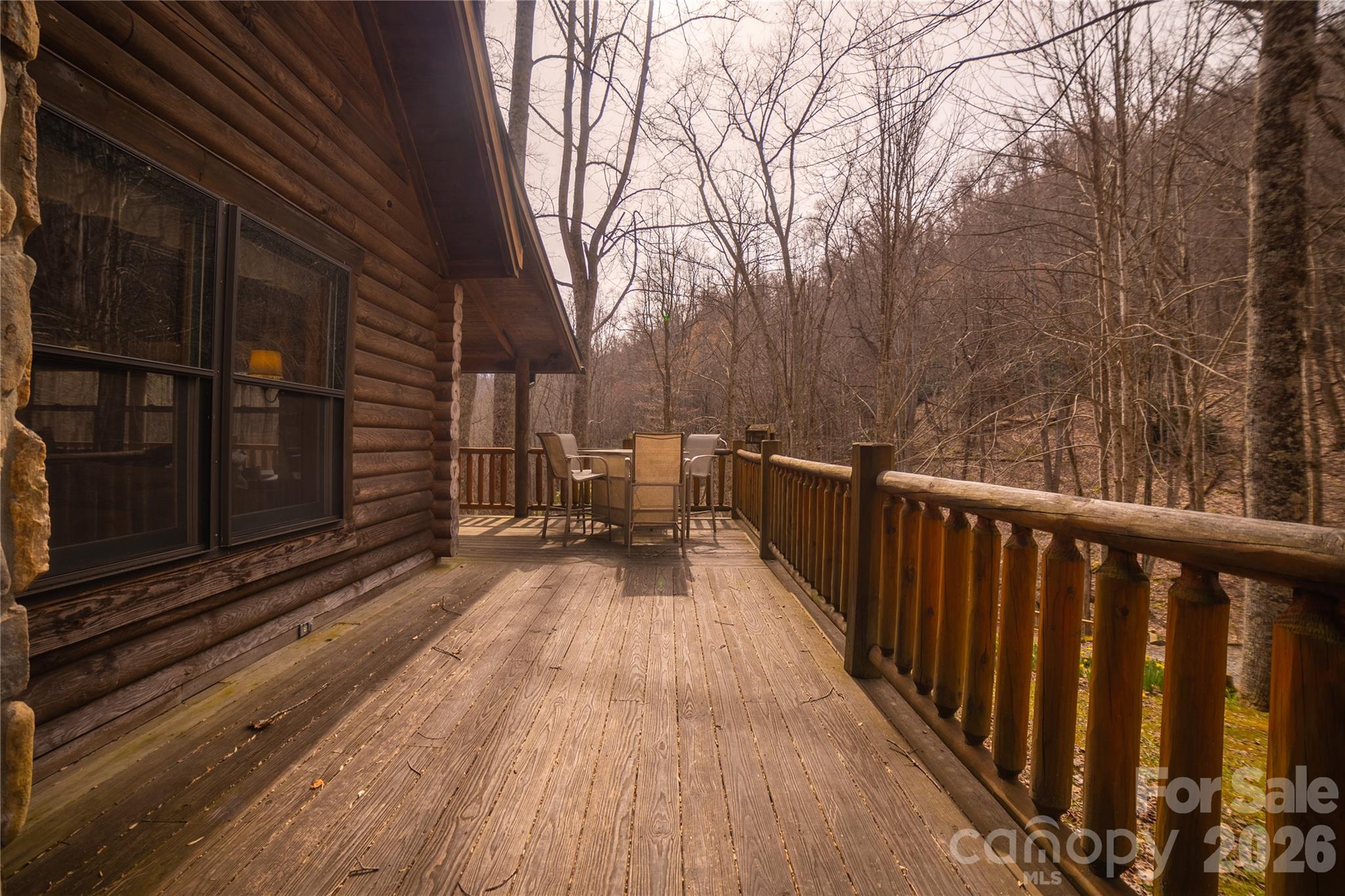 682 Rock House Road Hot Springs, NC 28743 - Photo 25 of 43 a view of balcony with wooden floor and fence