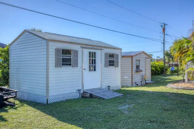 a view of a garden with houses