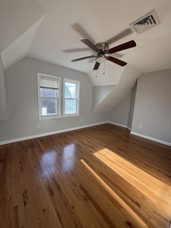 629 Highland Avenue, Unit 3 Fall River, MA 02720 - Photo 3 of 8 a view of empty room with wooden floor and fan