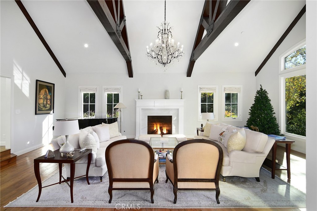 28600 Wagon Road Agoura Hills, CA 91301 - Photo 11 of 44 a living room with furniture and a fireplace