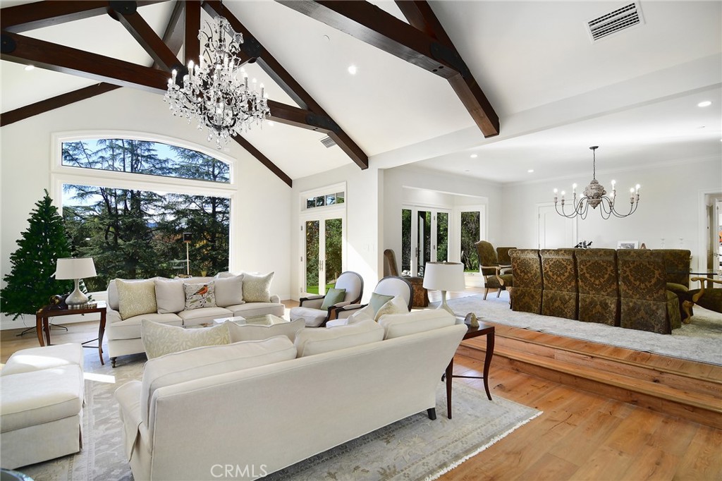 28600 Wagon Road Agoura Hills, CA 91301 - Photo 12 of 44 a living room with furniture or chandelier and a large window
