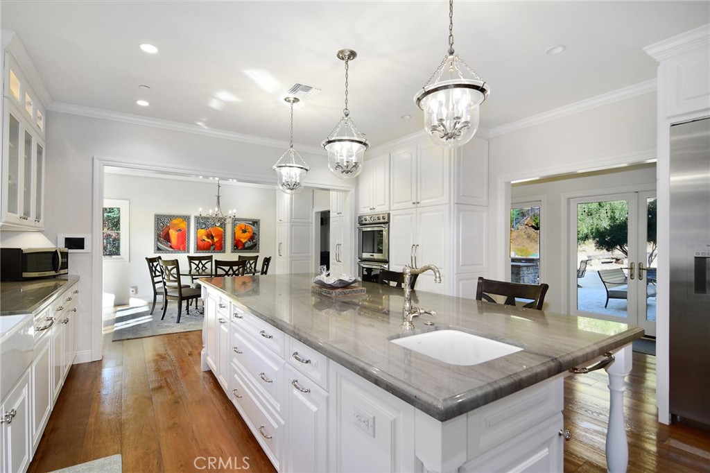 28600 Wagon Road Agoura Hills, CA 91301 - Photo 16 of 44 a kitchen with lots of counter space
