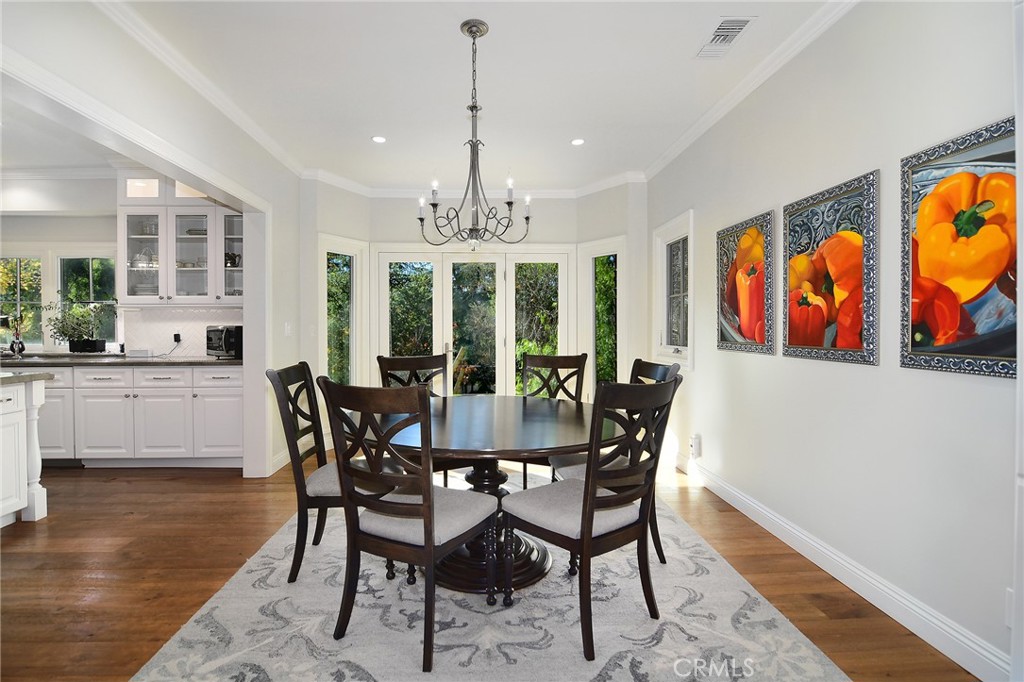 28600 Wagon Road Agoura Hills, CA 91301 - Photo 17 of 44 a view of a dining room with furniture window and wooden floor