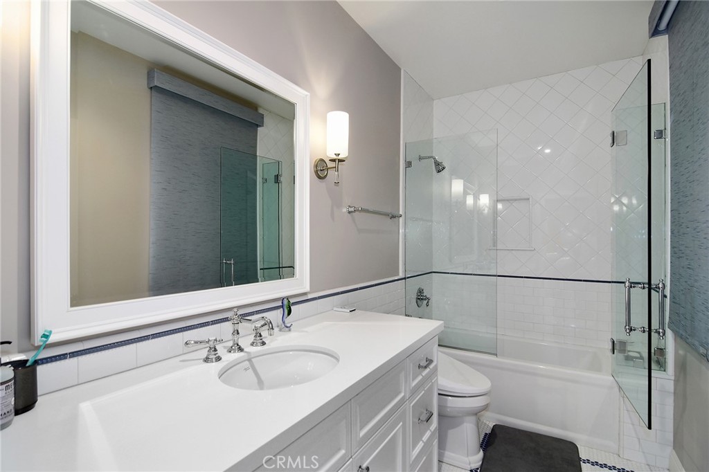 28600 Wagon Road Agoura Hills, CA 91301 - Photo 26 of 44 a bathroom with a bathtub shower sink and toilet