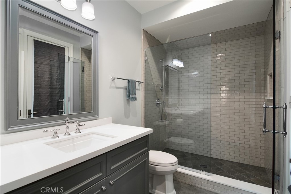 28600 Wagon Road Agoura Hills, CA 91301 - Photo 32 of 44 a bathroom with a sink a toilet and shower