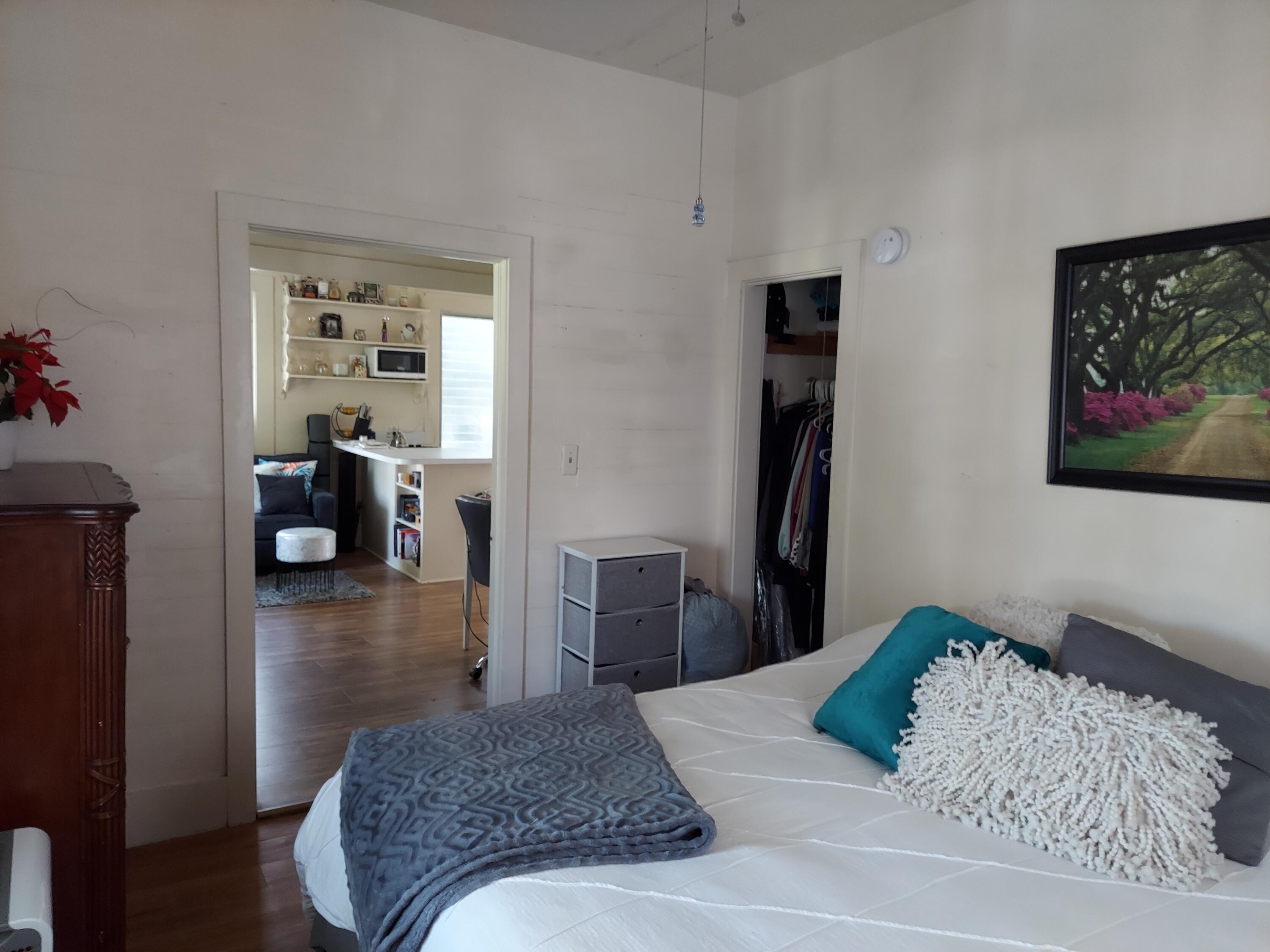 315 William Street Key West, FL 33040 - Photo 13 of 19 a bedroom with a bed and a couch