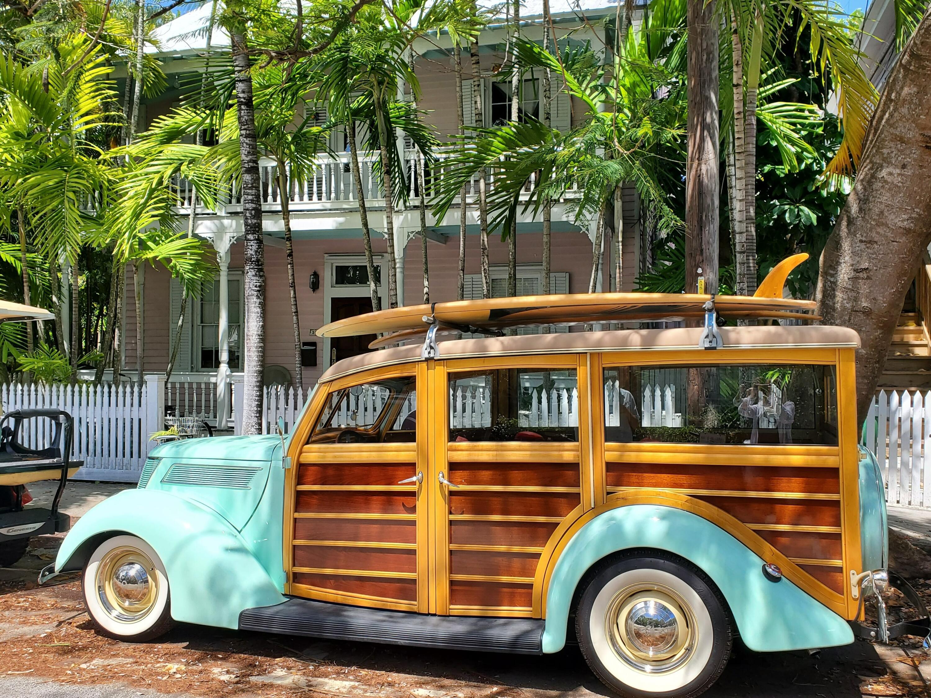 315 William Street Key West, FL 33040 - Photo 18 of 19 a front view of a house with a garden
