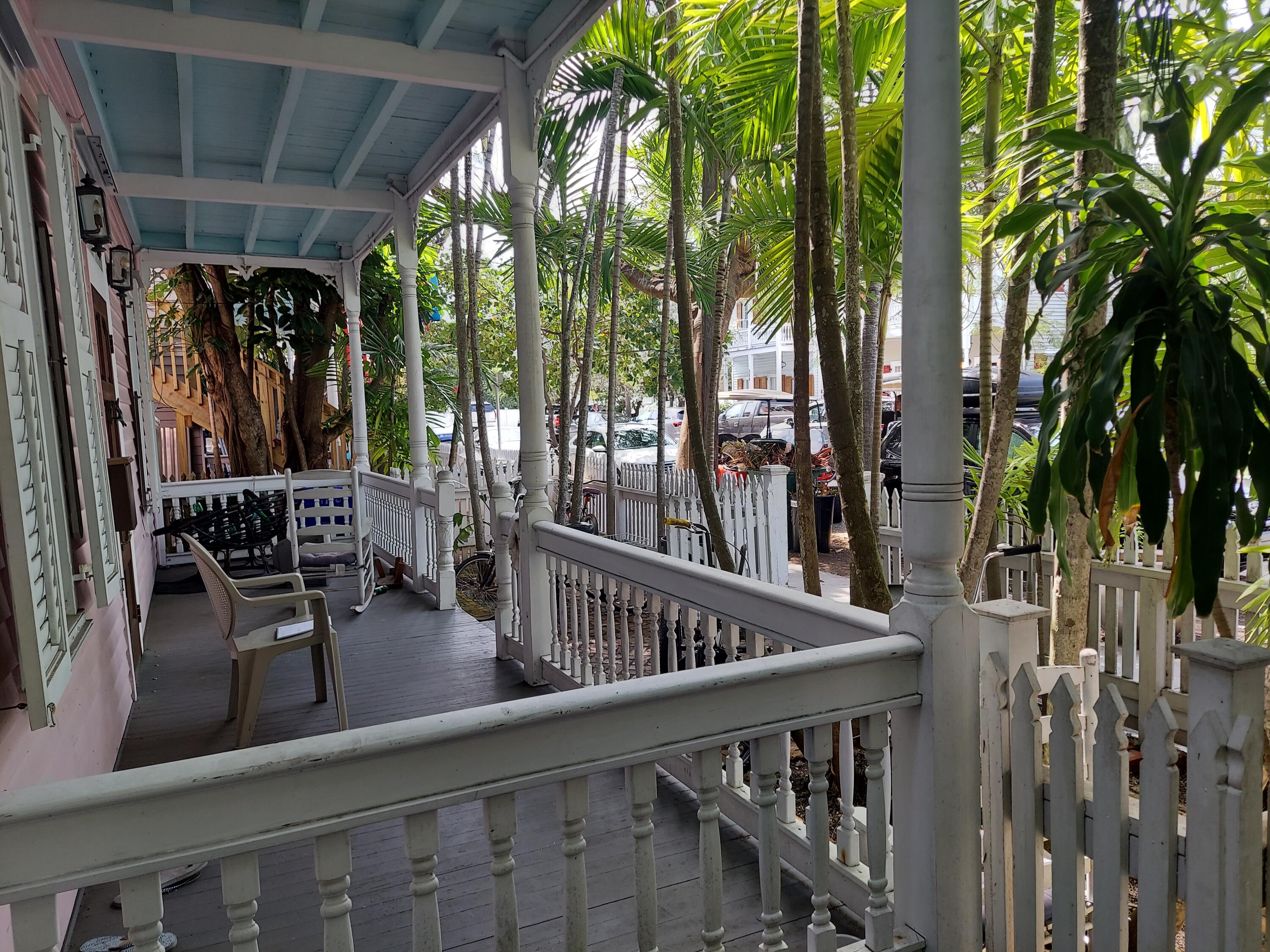 315 William Street Key West, FL 33040 - Photo 2 of 19 a view of swimming pool with outdoor seating and green space
