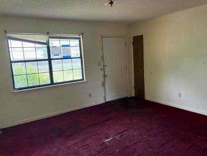 1502 Hall Street Bainbridge, GA 39819 - Photo 12 of 15 an empty room with a window