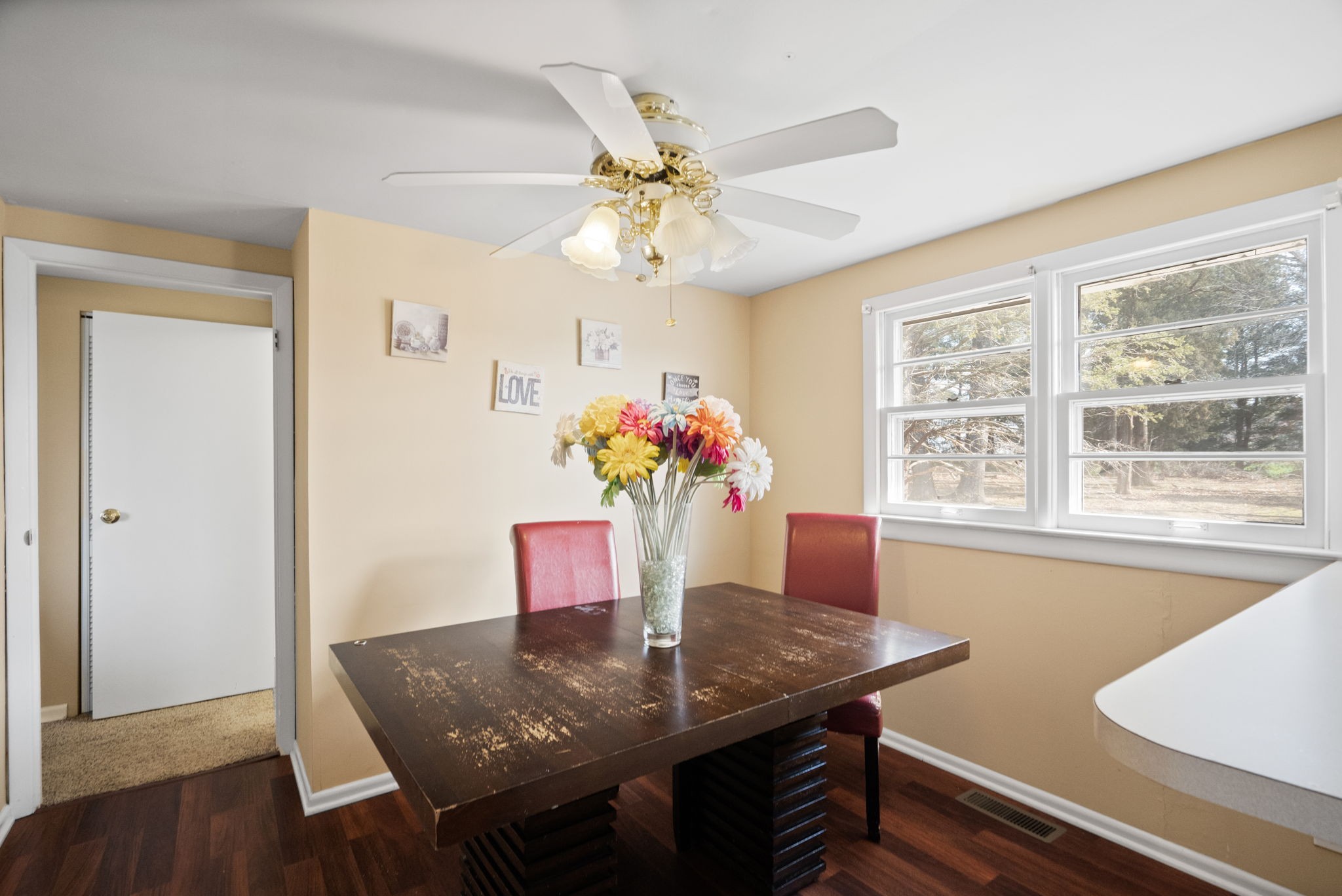 5915 Keysburg Road Adams, TN 37010 - Photo 15 of 26 a view of a dining room with furniture and a chandelier