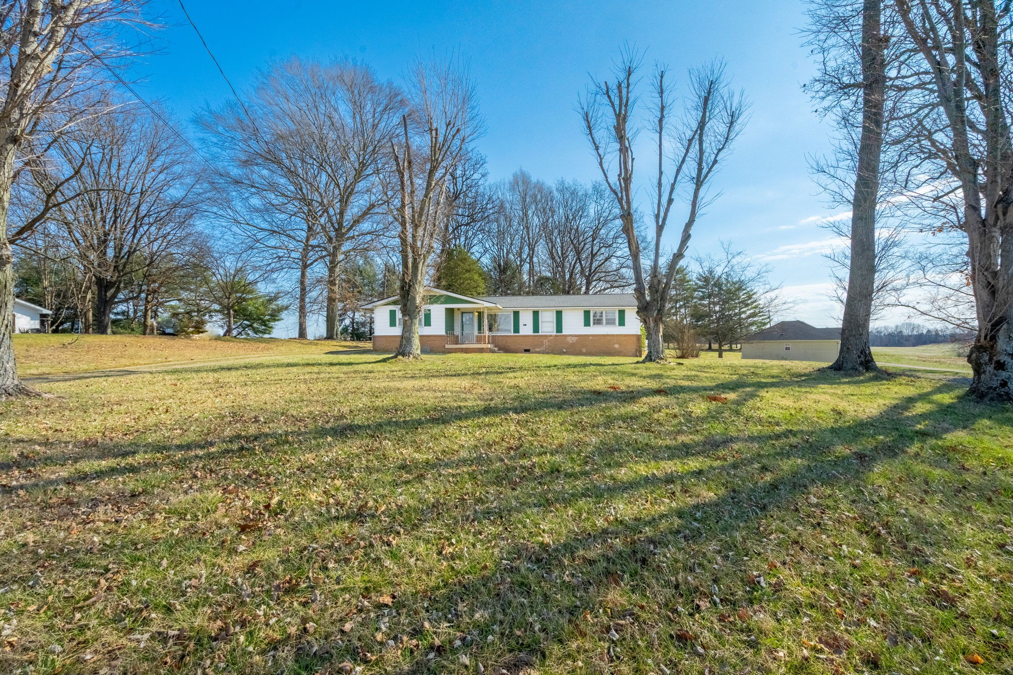 5915 Keysburg Road Adams, TN 37010 - Photo 3 of 26 a view of road with trees