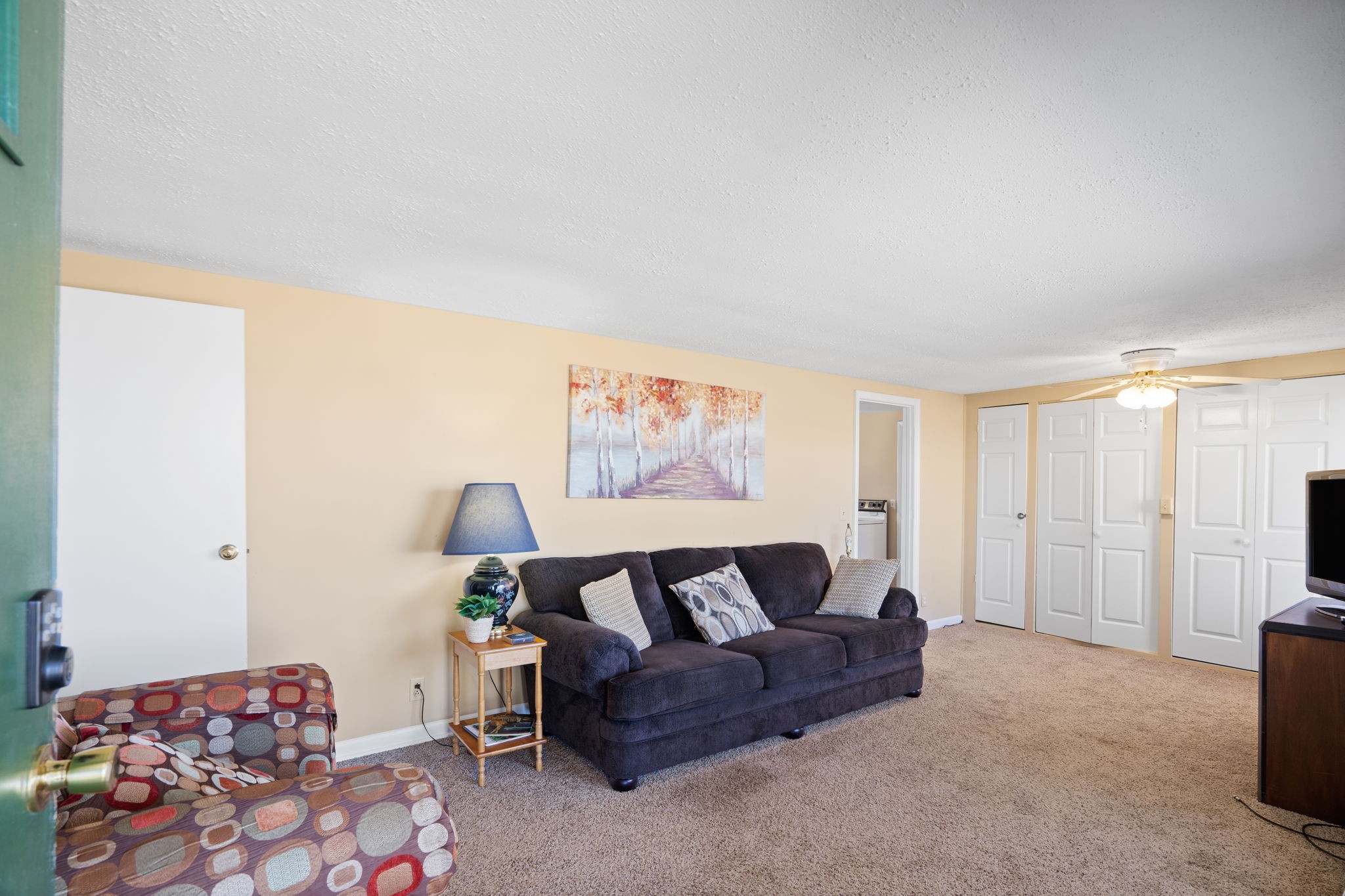 5915 Keysburg Road Adams, TN 37010 - Photo 10 of 26 a spacious bedroom with a bed and couch