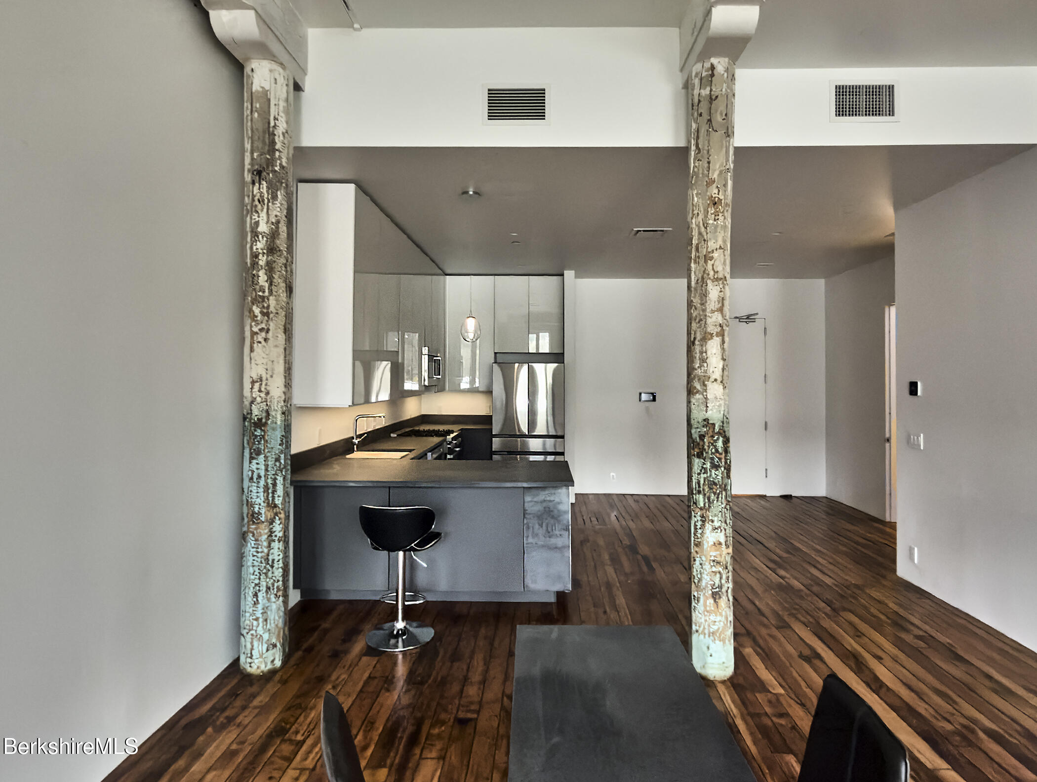 520 State Road, Unit 205 North Adams, MA 01247 - Photo 10 of 17 a view of kitchen with sink microwave and refrigerator