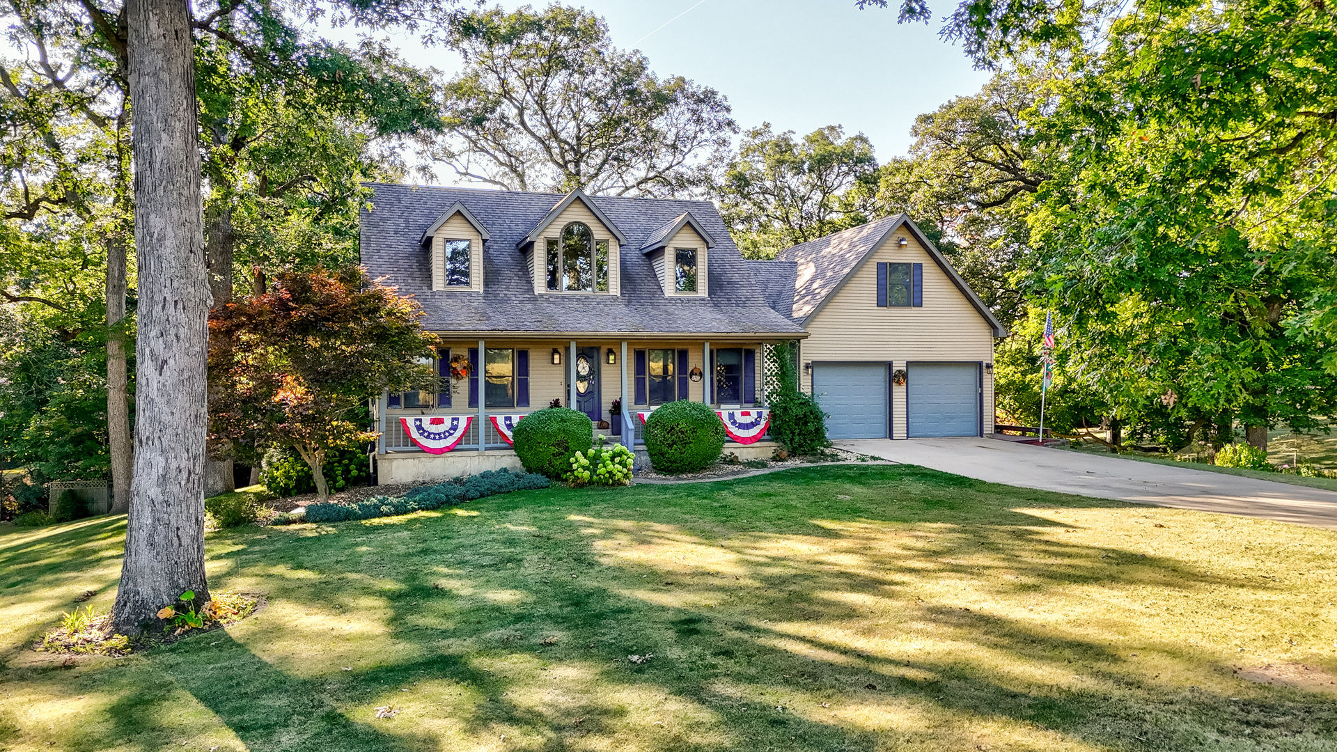 2115 East 875th Road Tonica, IL 61370 - Photo 1 of 33 a front view of a house with garden