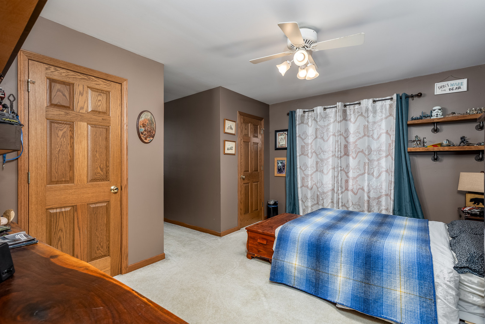 2115 East 875th Road Tonica, IL 61370 - Photo 15 of 33 a bedroom with a bed and a chandelier
