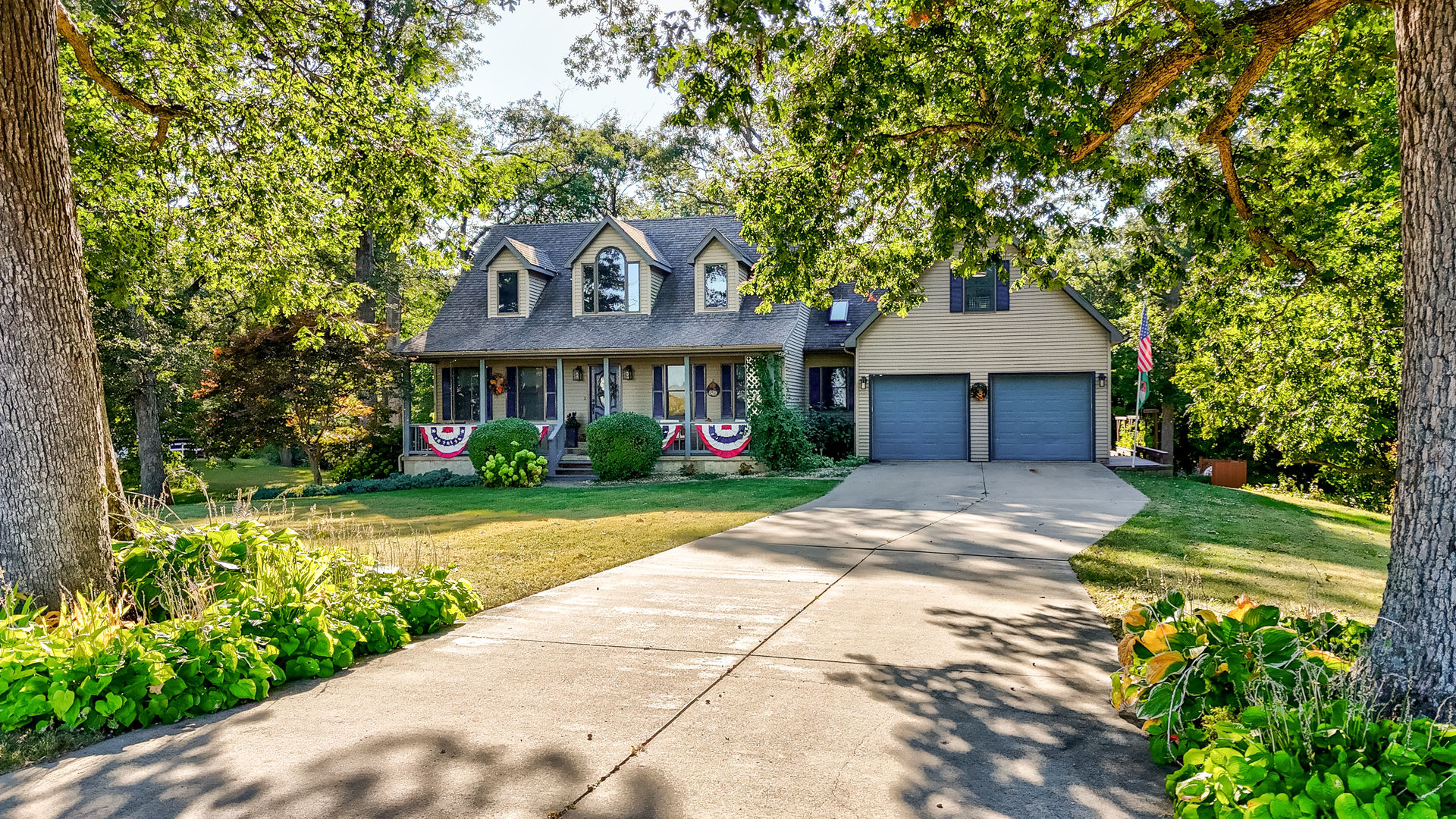 2115 East 875th Road Tonica, IL 61370 - Photo 22 of 33 a front view of a house with garden