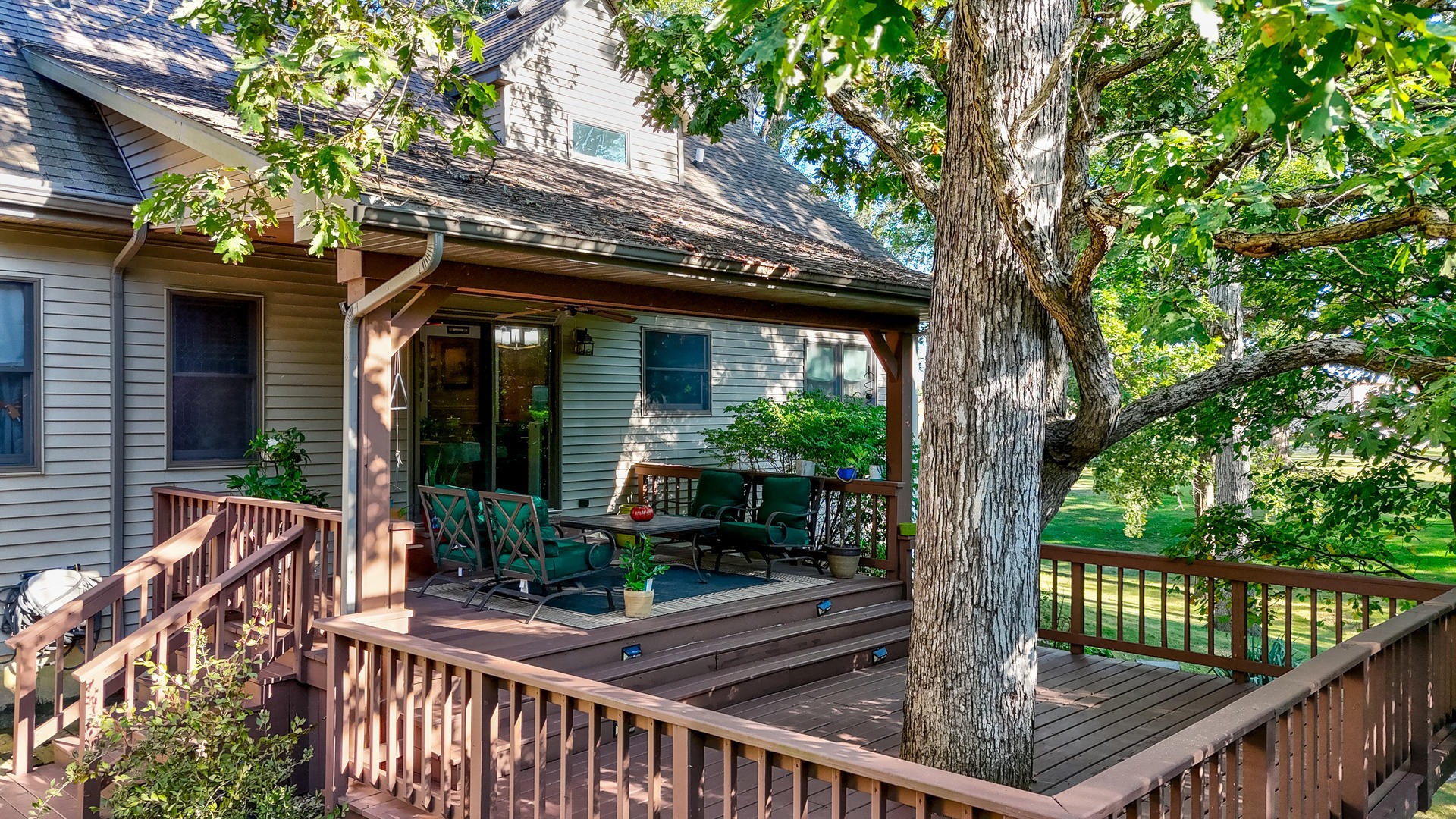 2115 East 875th Road Tonica, IL 61370 - Photo 24 of 33 a view of a chair and tables in the balcony