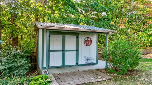 a wooden door in front of a house