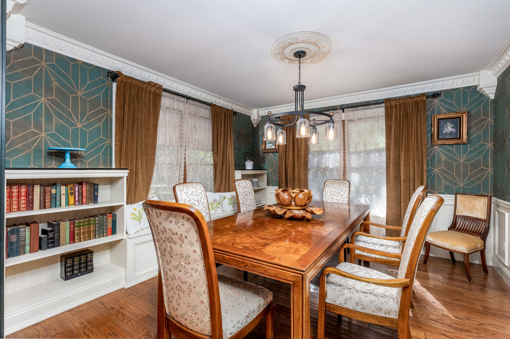 2115 East 875th Road Tonica, IL 61370 - Photo 7 of 33 a dining room with furniture a chandelier and wooden floor