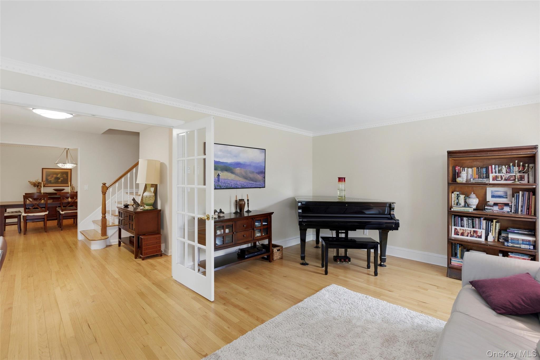 7 Gun Path Setauket, NY 11733 - Photo 6 of 34 a living room with furniture and a piano