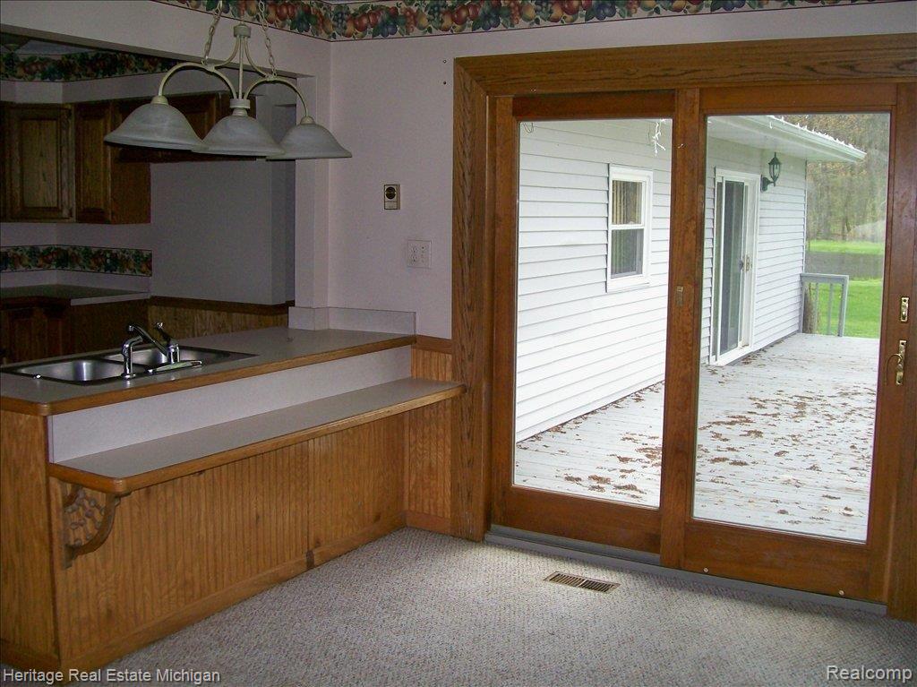 4477 Hinchey Road Howell, MI 48843 - Photo 10 of 14 Eating area large doorwall