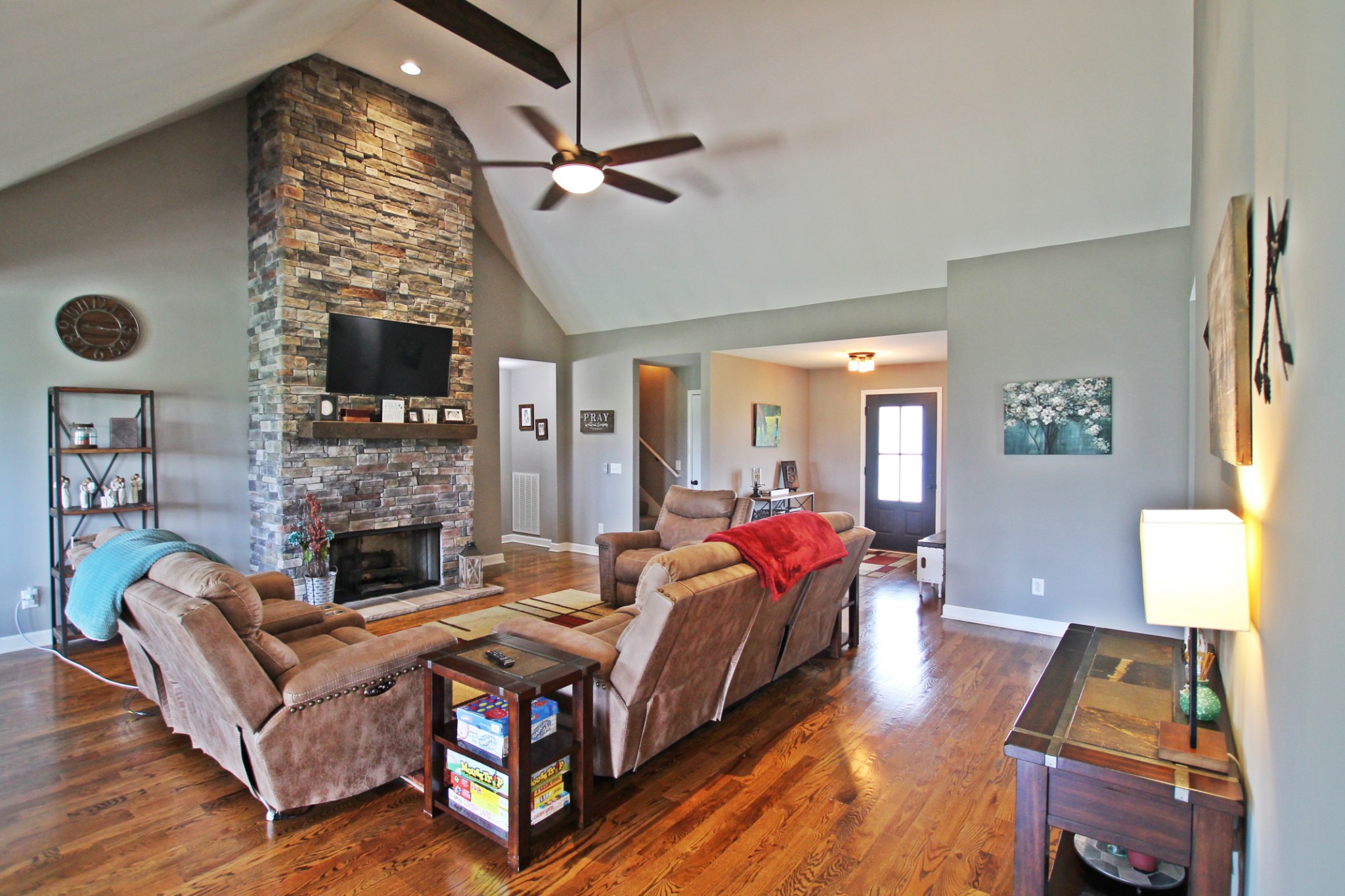 5191 Rippy Road Cross Plains, TN 37049 - Photo 3 of 48 a living room with a bed furniture and a fireplace
