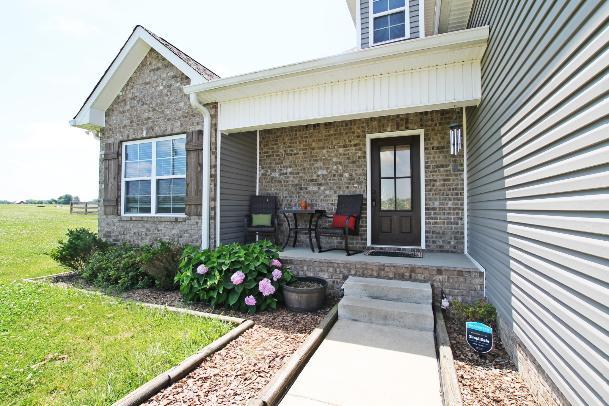 5191 Rippy Road Cross Plains, TN 37049 - Photo 37 of 48 a front view of a house with garden