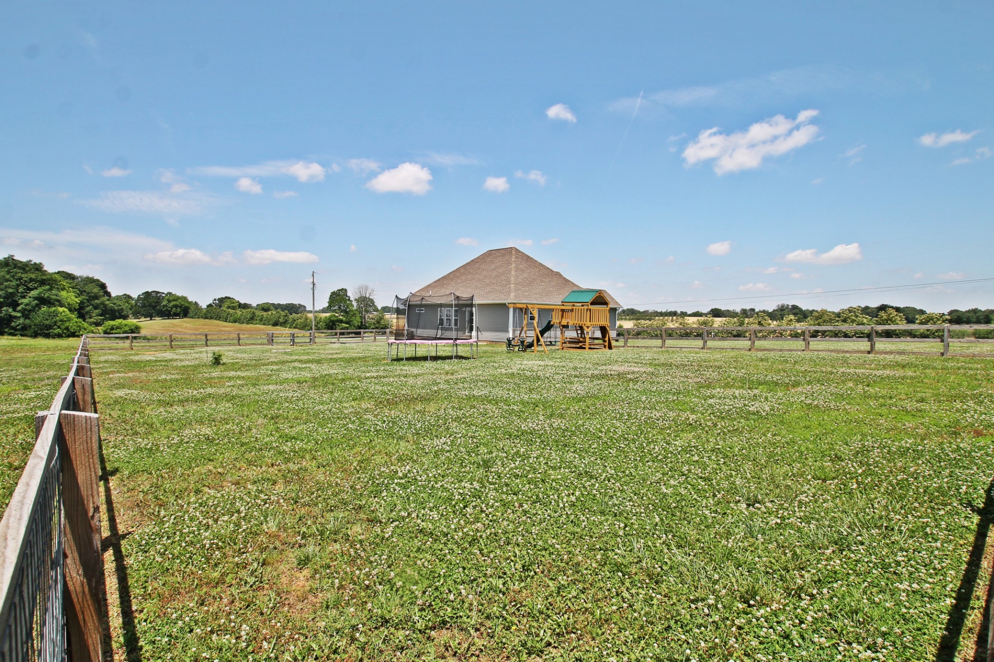 5191 Rippy Road Cross Plains, TN 37049 - Photo 41 of 48 a backyard of a house with table and chairs