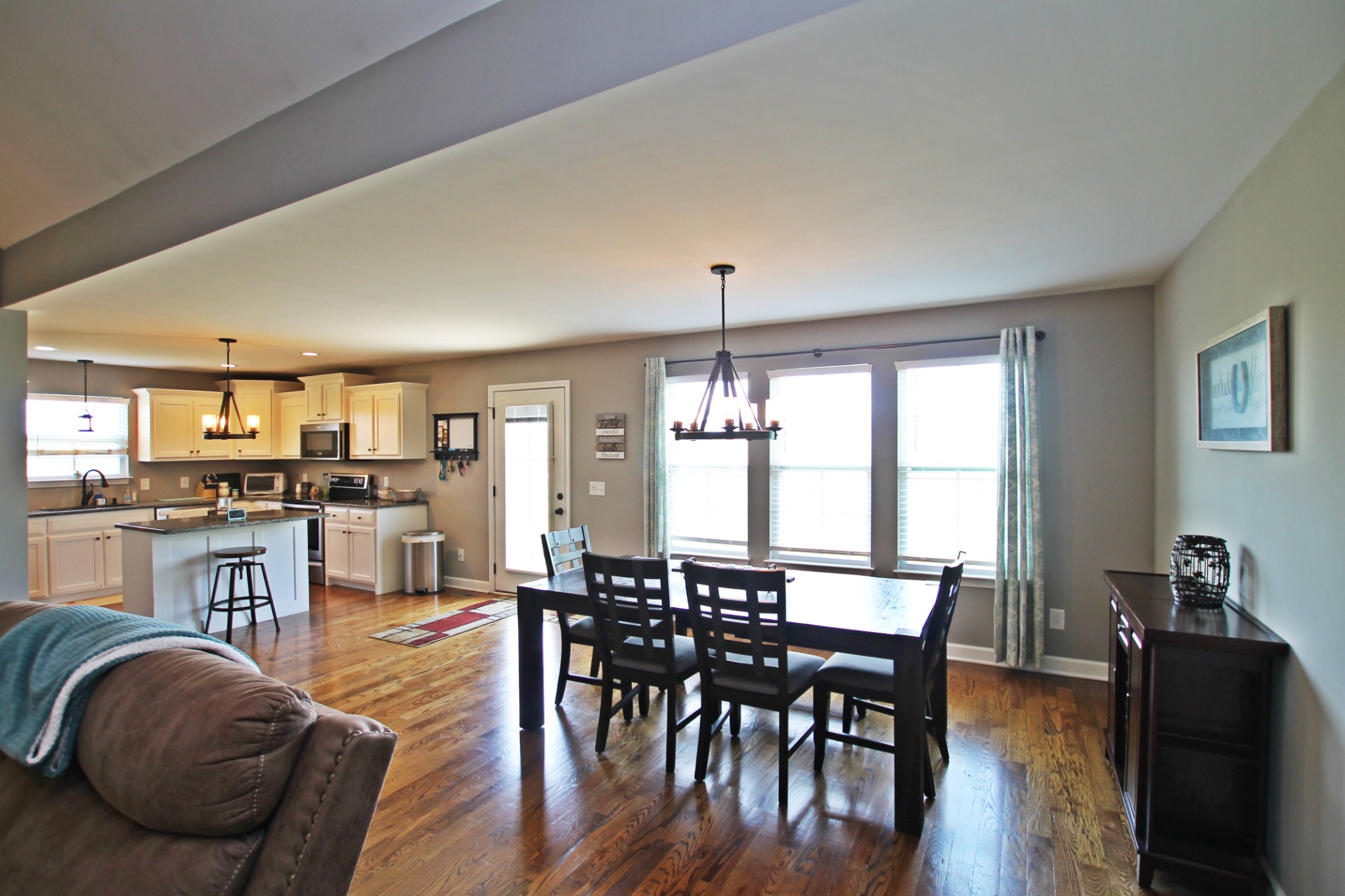5191 Rippy Road Cross Plains, TN 37049 - Photo 6 of 48 a view of a dining room with furniture and wooden floor