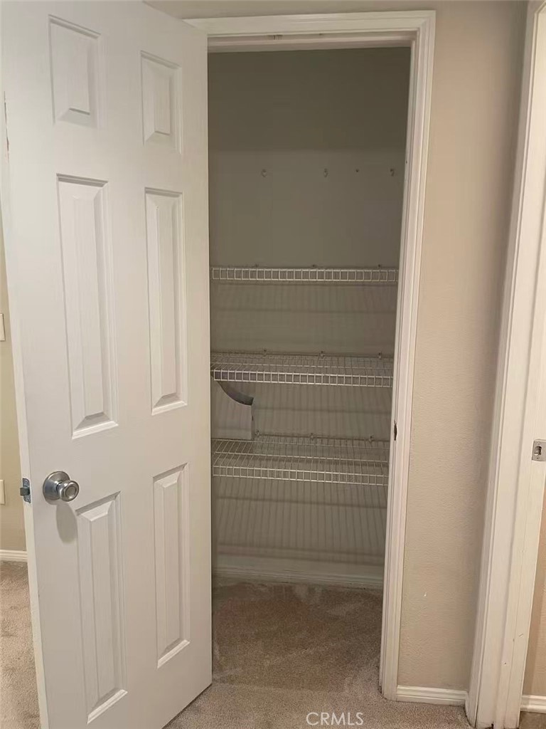 7353 Ellena West, Unit 28 Rancho Cucamonga, CA 91730 - Photo 14 of 29 a view of wooden door