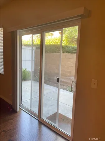 a view of a glass door and window